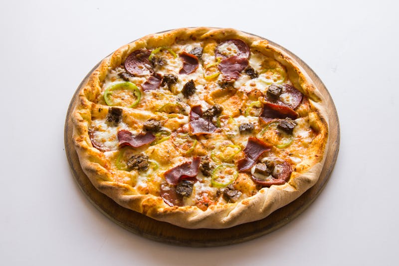 Meat Lovers Supreme Pizza with sausage and ham